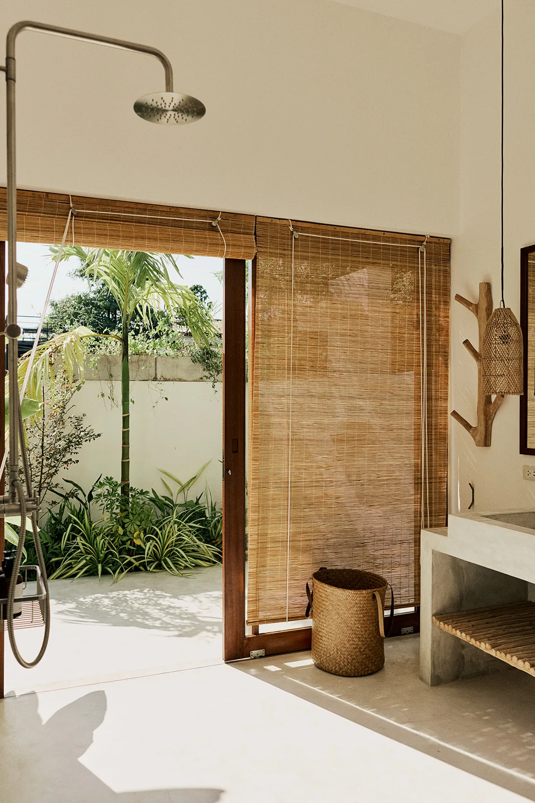 An open-air shower in a private garden bathroom