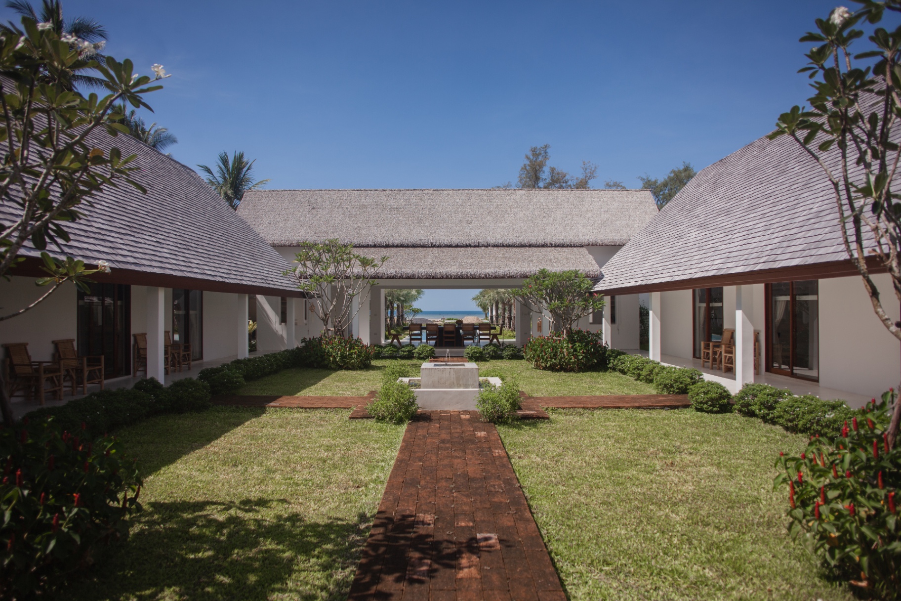 The courtyard at Villa Aditi with lush tropical flowers