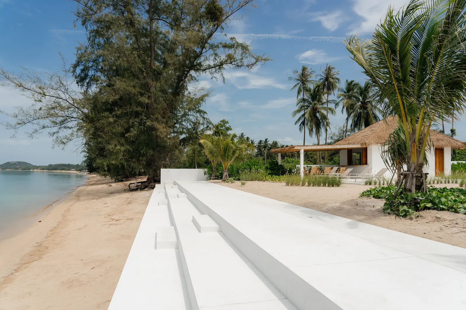 Villa Aditi beach stairs leading to sand with beach garden bar and palm trees, Bang Kao Beach, Koh Samui