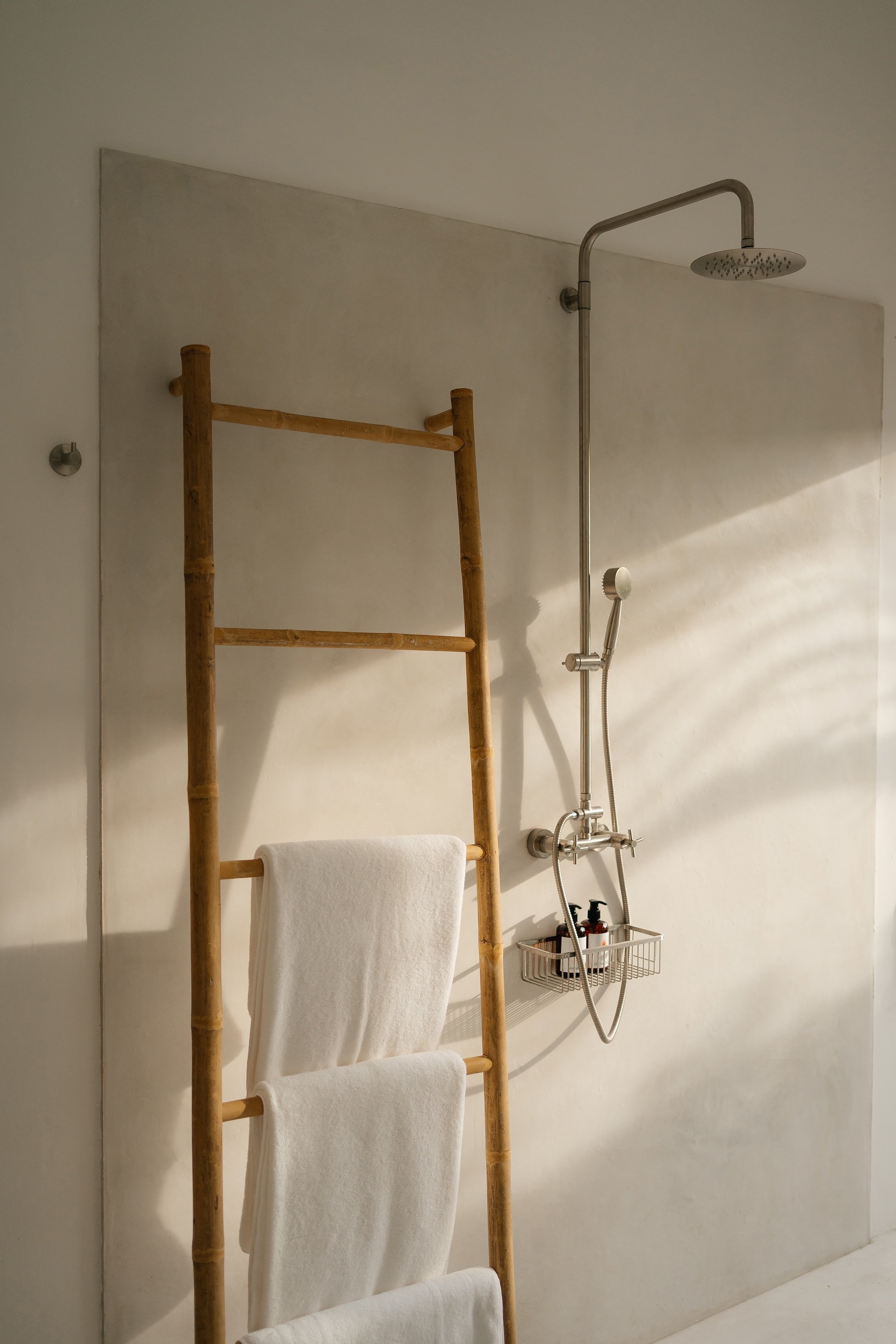 En-suite indoor shower with natural stone tiles at Villa Aditi, Koh Samui