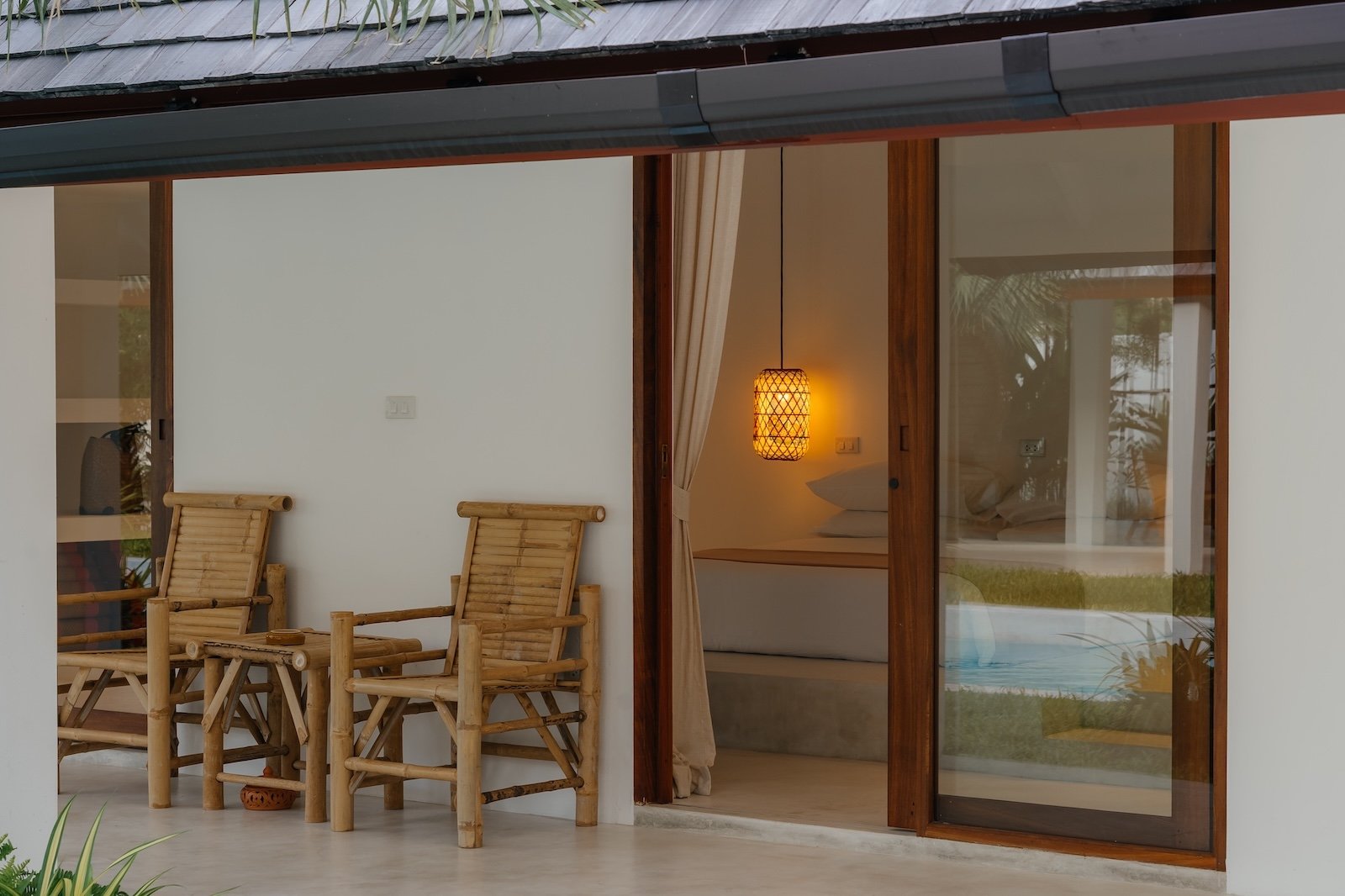 Villa Aditi master bedroom with private terrace and woven pendant lamp, Koh Samui