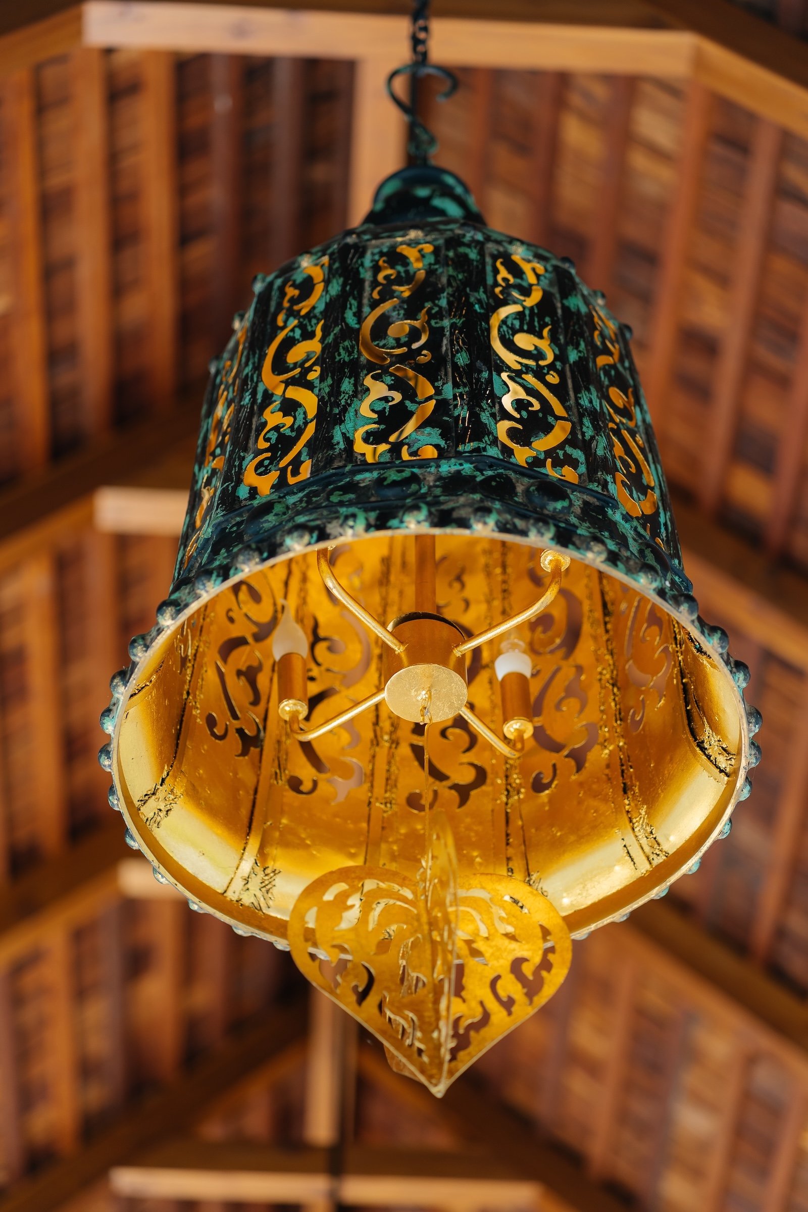 Vaulted wooden roof with hanging pendant lamp at Villa Aditi, Koh Samui