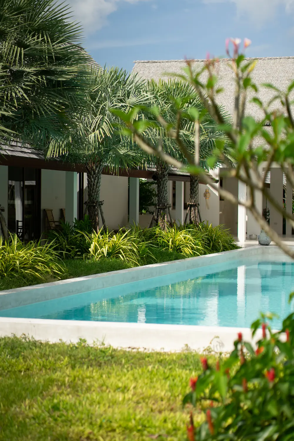 Villa Aditi pool terrace with sunbeds and outdoor dining, Koh Samui